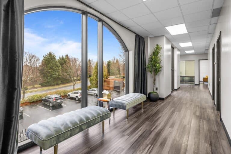 Archangel Centers Charlotte, bright hallway with floor-to-ceiling windows